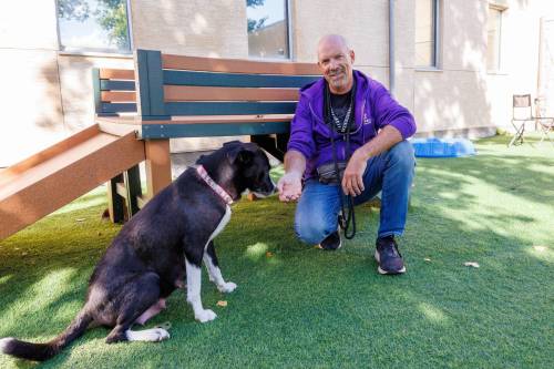 MIKE DEAL / FREE PRESS Tim Campbell with two-year-old Moira Rose at the Winnipeg Humane Society.