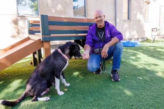 Tim Campbell with two-year-old Moira Rose at the Winnipeg Humane Society. (Mike Deal / Free Press)