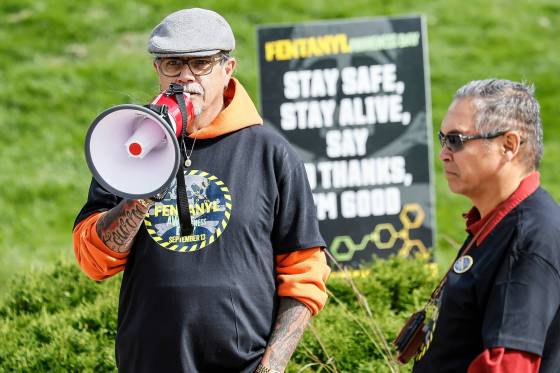 Joseph Foure speaks to participants at the Fentanyl Awareness Day Walk on Sunday. (John Woods / Free Press)