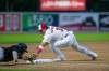 BROOK JONES / FREE PRESS
                                Winnipeg Goldeyes third baseman Ramón Bramasco attempts to tag out Brian Fuentes.