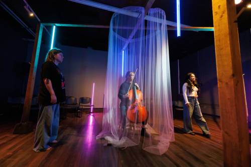 MIKE DEAL / FREE PRESS
                                Sap stars Hera Nalam (right) and Liz Whitbread (left) with Grace Morningstar providing live music on the cello.