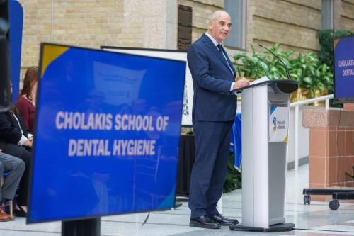 MIKE DEAL / FREE PRESS
                                Dr. Ernest Cholakis is celebrated Thursday morning in the University of Manitoba&rsquo;s Brodie Centre Atrium for his philanthropic gift of $2 million in support of dental care in Manitoba.