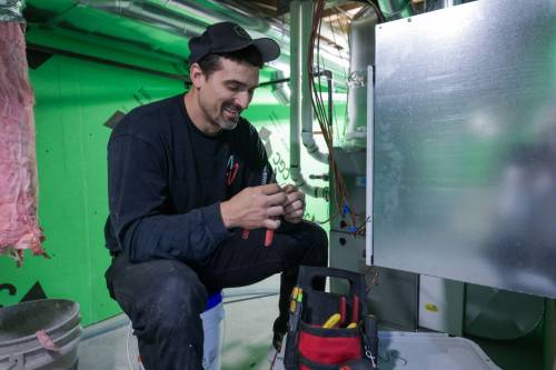 RUTH BONNEVILLE / FREE PRESS
                                Former Winnipeg Blue Bombers linebacker Shayne Gauthier started the company Haut Electrical with his Red Seal Journeyman electrician brother-in-law Marcus Hoch two years ago.