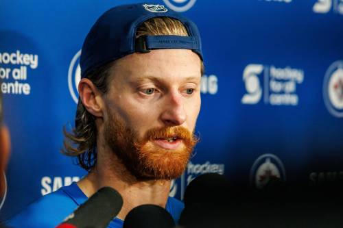 Mike Deal / FREE PRESS
                                Winnipeg Jets forward Kyle Connor, who is close friends with goalie Connor Hellebuyck, said Thursday there were &lsquo;signs throughout the whole summer&rsquo; that the netminder was thinking about not returning to the club for the season.