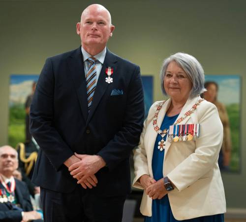 Adrian Wyld / THE CANADIAN PRESS FILES
                                Hard-hitting former Winnipeg Jets defenceman Jim Kyte (left) was given the Order of Canada back in May by then Governor General Mary Simon for his championing the rights of athletes with disabilities. His current fight is pressuring government for equitable funding of deaf athletes.