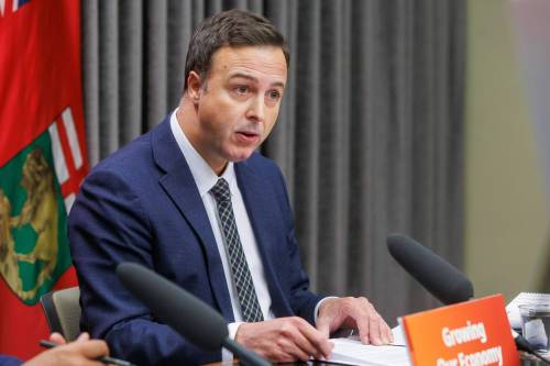 MIKE DEAL / FREE PRESS
                                Manitoba Finance Minister Adrien Sala at the announcement the province is on track to balance the budget next year after cutting the deficit in half.