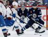 JOHN WOODS / FREE PRESS
                                Winnipeg Jets&rsquo; goaltender Stuart Skinner keeps his eyes on the puck as teammate Mario Ferraro defends against Colorado Avalanche&rsquo;s Nikita Prishchepov during the second period of the Jets pre-season game against the Avs, Monday in Winnipeg.