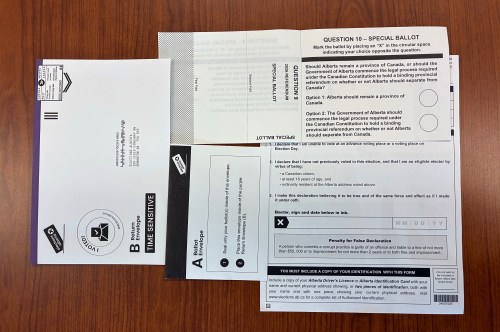 An Alberta referendum package is pictured in Edmonton on Wednesday, Sept. 9, 2026. Albertans will be voting on Oct. 19, 2026. THE CANADIAN PRESS/Jason Franson