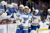 FILE - St. Louis Blues center Robert Thomas reacts after scoring an empty-net goal during the third period of an NHL hockey game against the Minnesota Wild, March 1, 2026, in St. Paul, Minn. (AP Photo/Ellen Schmidt, File)