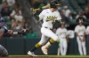 Athletics' Jeff McNeil hits a walk off RBI single during the ninth inning of a baseball game against the Toronto Blue Jays Monday, Sept. 7, 2026, in West Sacramento, Calif. (AP Photo/Scott Marshall)