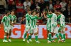 Real Betis players celebrate after scoring during the Champions League opening phase soccer match between Lille and Real Betis in Lille, France, Tuesday, Sept. 8, 2026. (AP Photo/Jean-Francois Badias)