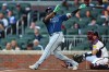 Tampa Bay Rays' Junior Caminero hits a solo home run in the first inning of a baseball game against the Atlanta Braves, Tuesday, Sept. 8, 2026, in Atlanta. (AP Photo/Colin Hubbard)