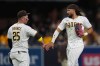 San Diego Padres right fielder Fernando Tatis Jr., right, celebrates with first baseman Ty France after the Padres defeated the Washington Nationals 5-4 in a baseball game Tuesday, Sept. 8, 2026, in San Diego. (AP Photo/Gregory Bull)