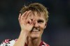Arsenal's Martin Odegaard celebrates after scoring the opening goal during their Champions League soccer match between Napoli and Arsenal, in Naples, southern Italy, Wednesday, Sept. 9, 2026. (AP Photo/Gregorio Borgia)