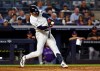 New York Yankees' George Lombard Jr. hits a grand slam against the Colorado Rockies during the third inning of a baseball game, Wednesday, Sept. 9, 2026, in New York. (AP Photo/Noah K. Murray)