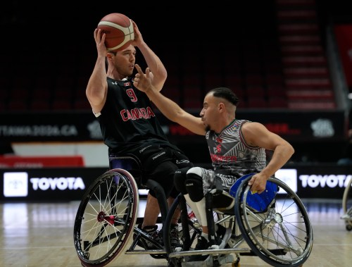 Morocco's Bilal Ben Hamman Lechhab (right) pressures Canada's Colin Higgins (9) during first half IWBF Wheelchair Basketball World Championships group stage action in Ottawa, Wednesday Sept. 9, 2026.  THE CANADIAN PRESS/Adrian Wyld