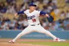 Los Angeles Dodgers pitcher Yoshinobu Yamamoto throws to the plate during the first inning of a baseball game against the Cincinnati Reds, Wednesday, Sept. 9, 2026, in Los Angeles. (AP Photo/Mark J. Terrill)
