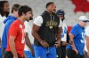 Los Angeles Rams outside linebacker Myles Garrett, centre, works out during a practice session for an NFL football game against the San Francisco 49ers., in Melbourne, Australia, Thursday, Sept. 10, 2026.(AP Photo/Asanka Brendon Ratnayake)