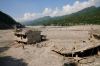Nepal army soldiers inspect houses destroyed by recent flash floods in Betrawati, Nepal, Tuesday, Sept. 8, 2026. (AP Photo/Dar Yasin)