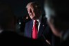 President Donald Trump speaks to reporters before he boards Air Force One at Dallas Fort Worth International Airport, Thursday, Sept. 10, 2026, in Dallas. (AP Photo/Julia Demaree Nikhinson)