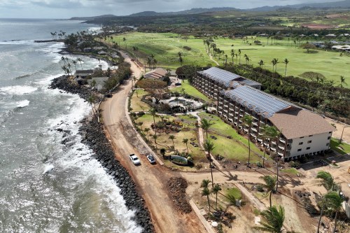 Homes and hotels damaged by Hurricane Lowell are seen Thursday, Sept. 10, 2026, in Poipu on Kauai’s south shore, Hawaii. (Nathan Eagle/Honolulu Civil Beat via AP)