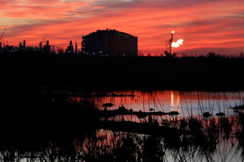 FILE - A flare burns at Venture Global LNG in Cameron, La., on April 1, 2022. (AP Photo/Martha Irvine, File)