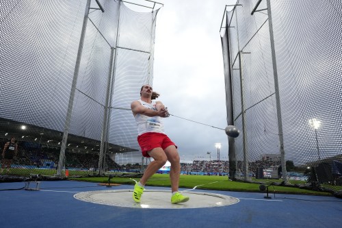 Ethan Katzberg, of Canada, makes an attempt in the men's hammer throw final at the Commonwealth Games in Glasgow, Scotland, Monday, July 27, 2026. Katzberg, the reigning Olympic and world champion, failed to record a mark at the World Athletics Ultimate Championship on Friday and was eliminated after two rounds. (AP Photo/Alastair Grant)
