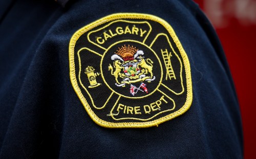 A Calgary Fire Department crest is pictured in Calgary, Tuesday, Aug. 11, 2026.THE CANADIAN PRESS/Jeff McIntosh