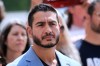 Democratic nominee for U.S. Senate Abdul El-Sayed listens during a news conference at the Spirit of Detroit monument Wednesday, Aug. 19, 2026, in Detroit. (AP Photo/Paul Sancya)