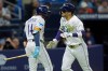 Tampa Bay Rays' Victor Mesa Jr. celebrates his solo home run off Houston Astros pitcher Ethan Pecko with Chandler Simpson (14) during the fifth inning of a baseball game Friday, Sept. 11, 2026, in St. Petersburg, Fla. (AP Photo/Chris O'Meara)