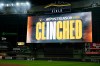 A message is displayed to signify the Milwaukee Brewers clinching a postseason berth after a baseball game against the Cincinnati Reds, Friday, Sept. 11, 2026, in Milwaukee. (AP Photo/Aaron Gash)
