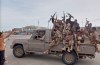This image taken from undated video released by Al-Masirah TV, a channel owned by Yemen's Houthi rebels, on Friday, Sept. 11, 2026, shows, according to the channel, Houthi fighters chanting atop a pickup truck in Khawkhah, Hodeida province, Yemen. (Al-Masirah TV via AP)