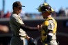 San Diego Padres pitcher Mason Miller, left, and Luis Campusano, right, celebrate their team's victory against the San Francisco Giants during a baseball game in San Francisco, Saturday, Sept. 12, 2026. (AP Photo/Jed Jacobsohn)