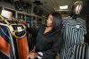 Fatoumata Dosso, the founder of DAF Collection, shows her Made in Benin clothes inside her showroom in Parakou, northern Benin, Saturday, May 16, 2026. (AP Photo/Sunday Alamba)