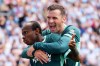 Brighton and Hove Albion's Malick Yalcouye, left, celebrates with Pascal Gross after scoring their side's second goal of the game during the English Premier League soccer match between Coventry City and Brighton and Hove Albion in Coventry, England, Sunday Sept. 13, 2026. (Mike Egerton/PA via AP)