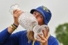 Anna Nordqvist, Europe team captain, kisses the trophy after her team won the Solheim Cup in Den Bosch, Netherlands, Sunday, Sept. 13, 2026. (AP Photo/Alastair Grant)