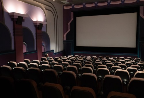 A man waits for the film Back to the Future to begin, at Caprice Cinemas, in Surrey, B.C., on Sunday, June 28, 2020. THE CANADIAN PRESS/Darryl Dyck