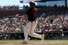 San Francisco Giants' Rafael Devers (16) watches his two-run home run during the first inning of a baseball game against the San Diego Padres in San Francisco, Saturday, Sept. 12, 2026. (AP Photo/Jed Jacobsohn)