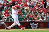 St. Louis Cardinals' Alec Burleson hits a three RBI double during the sixth inning of a baseball game against the Chicago White Sox, Sunday, Sept. 13, 2026, in St. Louis. (AP Photo/Scott Kane)