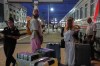 A 28-year-old digital content marketer who decided to leave Russia stands near his packed belongings at the railway station in Krasnodar, Russia, on Saturday, Aug. 29, 2026. He asked not to be identified because of security concerns. (AP Photo)