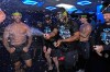Tampa Bay Rays' Junior Caminero spreays champagne on teammates after the team clinched a playoff spot with a win over the Houston Astros during a baseball game Friday, Sept. 11, 2026, in St. Petersburg, Fla. (AP Photo/Chris O'Meara)