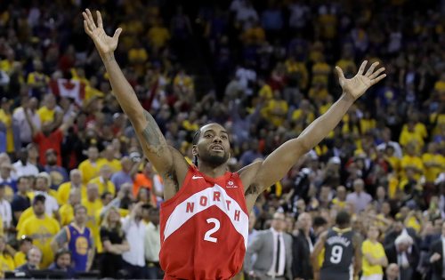 Toronto Raptors forward Kawhi Leonard celebrates after the Raptors defeated the Golden State Warriors in Game 6 of the NBA Finals in Oakland, Calif., Thursday, June 13, 2019. (AP Photo/Ben Margot)
