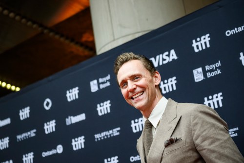 Tom Hiddleston arrives on the red carpet ahead of the première of 