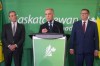 Prime Minister Mark Carney speaks at Canada's national investment summit as Bell Canada CEO Mirko Bibic, left, and Saskatchewan Premier Scott Moe look on, in Toronto, on Monday, Sept. 14, 2026. THE CANADIAN PRESS/Nathan Denette