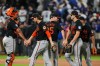 Baltimore Orioles' Gunnar Henderson (2), Pete Alonso (25) and Coby Mayo (16) celebrate with teammates after a baseball game against the New York Mets Monday, Sept. 14, 2026, in New York. (AP Photo/Frank Franklin II)