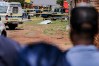 A body, believed to be that of a woman, is found along a road in KwaThema, Springs, South Africa, Tuesday, Sept. 15, 2026. (AP Photo)