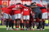 Man United team huddles just prior to kick off of the English Premier League soccer match between Manchester United and Manchester City in Manchester, England, Sunday, Sept. 13, 2026. (AP Photo/Ian Hodgson)
