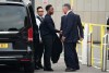 Former England soccer player Raheem Sterling, second left, arrives at Basingstoke Magistrates' Court ahead of his first appearance accused of dangerous driving in Hampshire, England, Tuesday, Sept. 15, 2026. (Andrew Matthews/PA via AP)