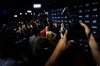 Actress Amanda Seyfried is photographed speaking to the media on the red carpet for the film 