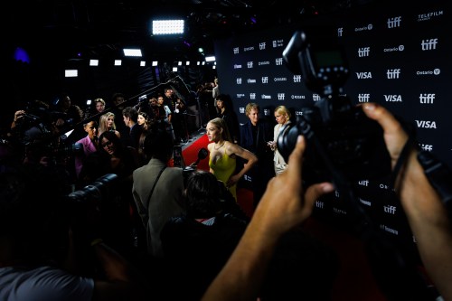 Actress Amanda Seyfried is photographed speaking to the media on the red carpet for the film 